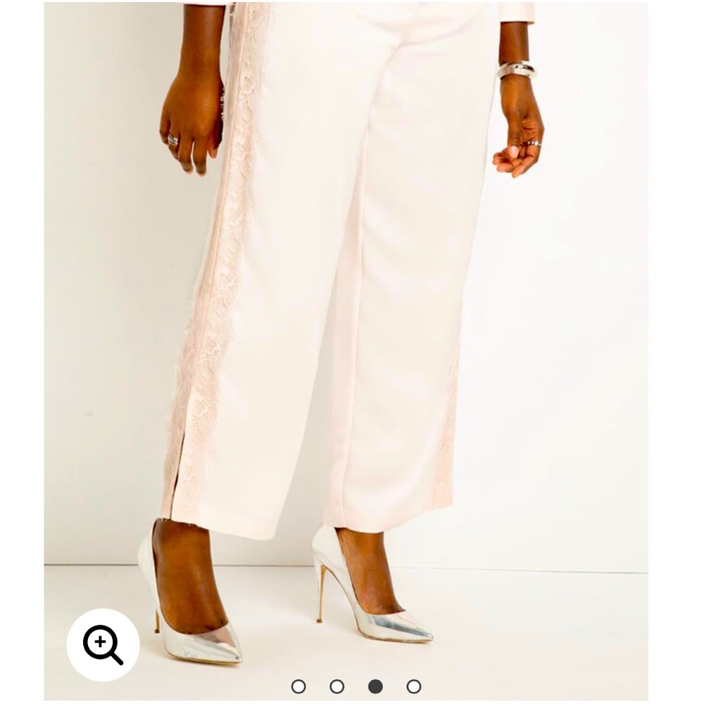 Soft pale pink 2 piece outfit. Satiny fabric with elastic waist & button top.